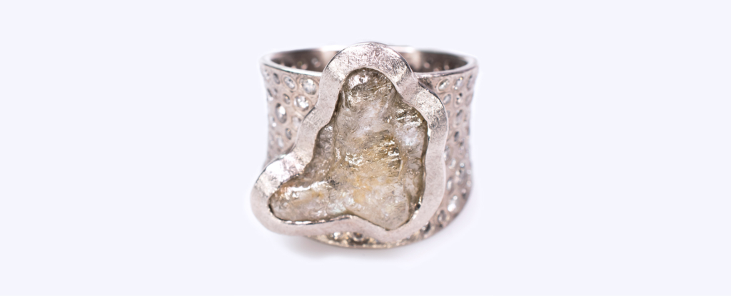 Photo of Todd Reed One of a Kind Ring rough diamond pale yellow with inset melee front straight on view 2